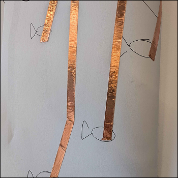 i started doodling pictures and placing coper tape as if it was part of the scene or illustration.