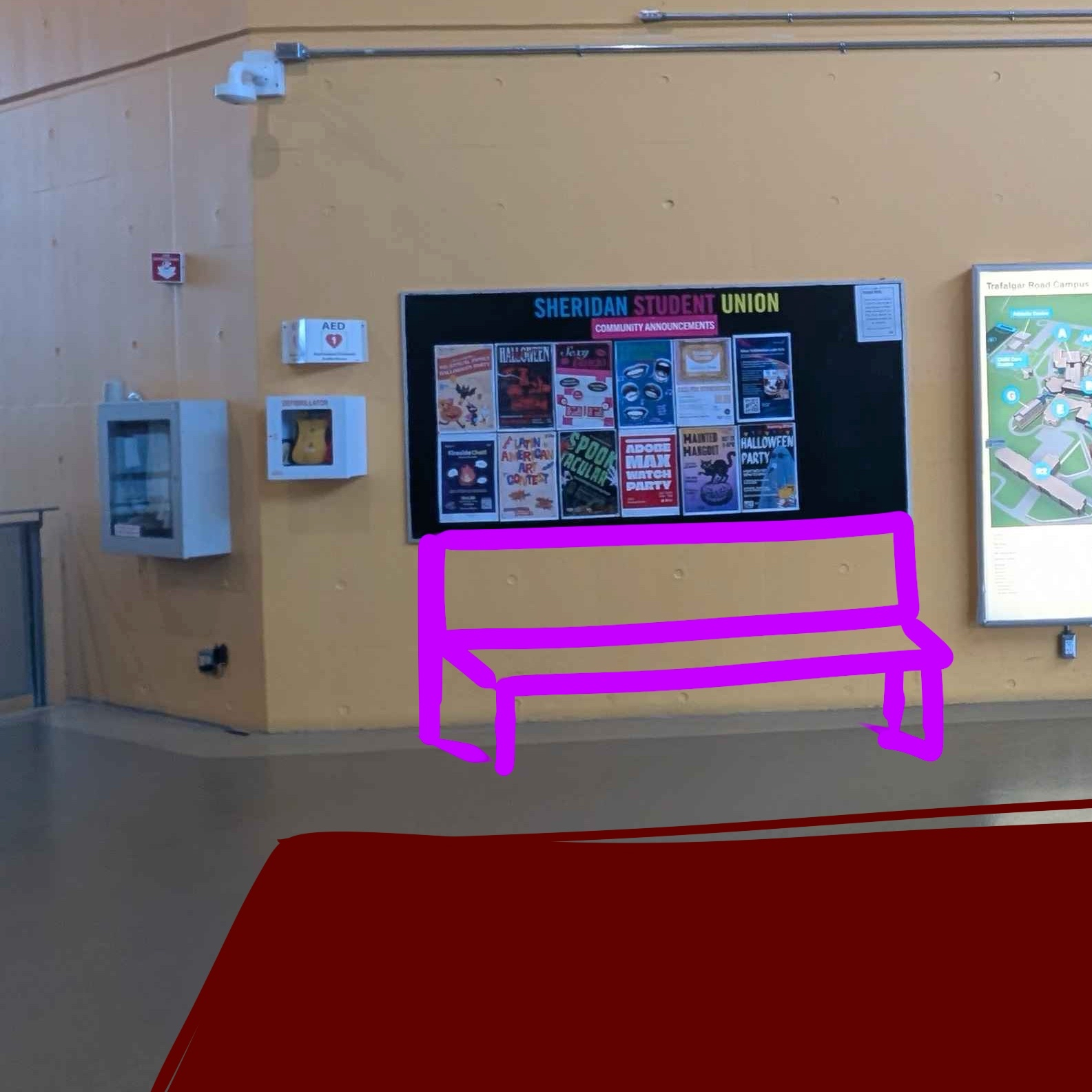 Adding a carpet to the floor is helpful during rainy or snowy days/ seasons. From my experience, I've almost slipped a lot in these areas, even if I'm walking slowly. This can be viewed as me clumsy but It's still a hazard that exists. Adding one of these rugs or mats in the open area would lessen the spread of wet floors or mud in the campus, resulting in less mess, or lessen the stains that snow, mud and other materials can cause.