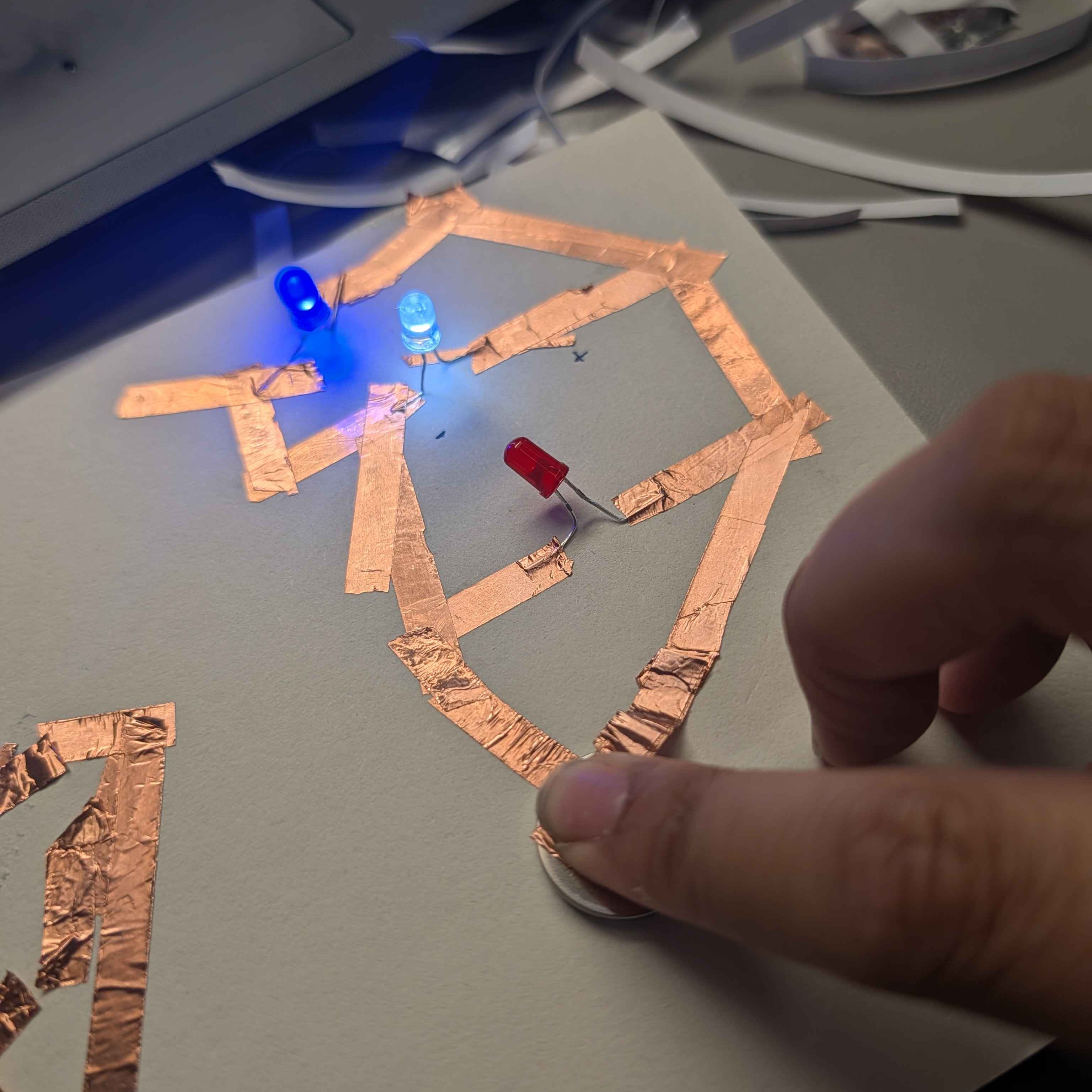 I tried to make mix of a parralel and series circut, this was a major failure since I was just playing around with how to light the LEDs up 