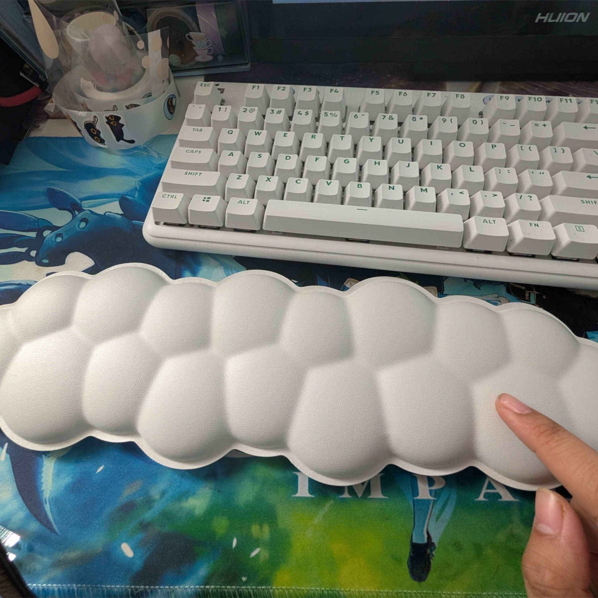 I rest my arms a lot on this arm rest while typing, sometimes from dusk to dawn. The touch is quite plush and soft. Sometimes I catch myself fidgeting it with it while attempting to focus.